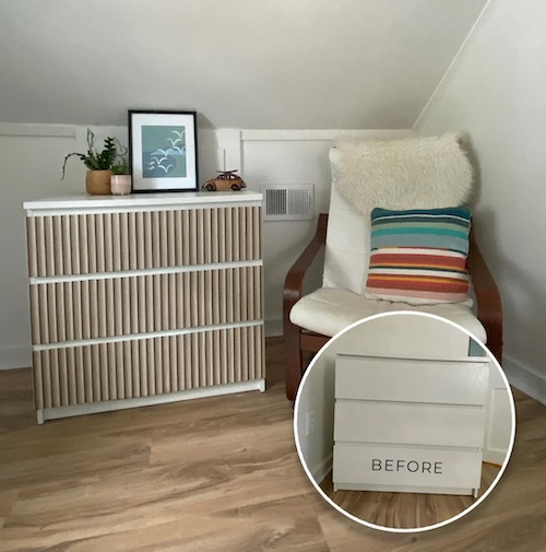 Photograph of a corner in a room with an accent chair and a cabinet that has recently been decorated with reeded wood peel and stick wallpaper