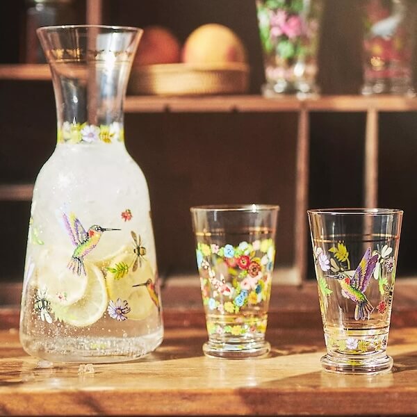 Botanic water carafe and glass set to use in a bedroom with sunflower print bedding.