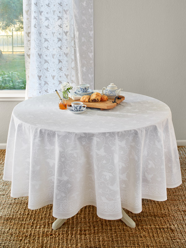 white cloth tablecloths
